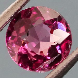 Glittering cherry pink .87ct Rhodolite Garnet solitaire