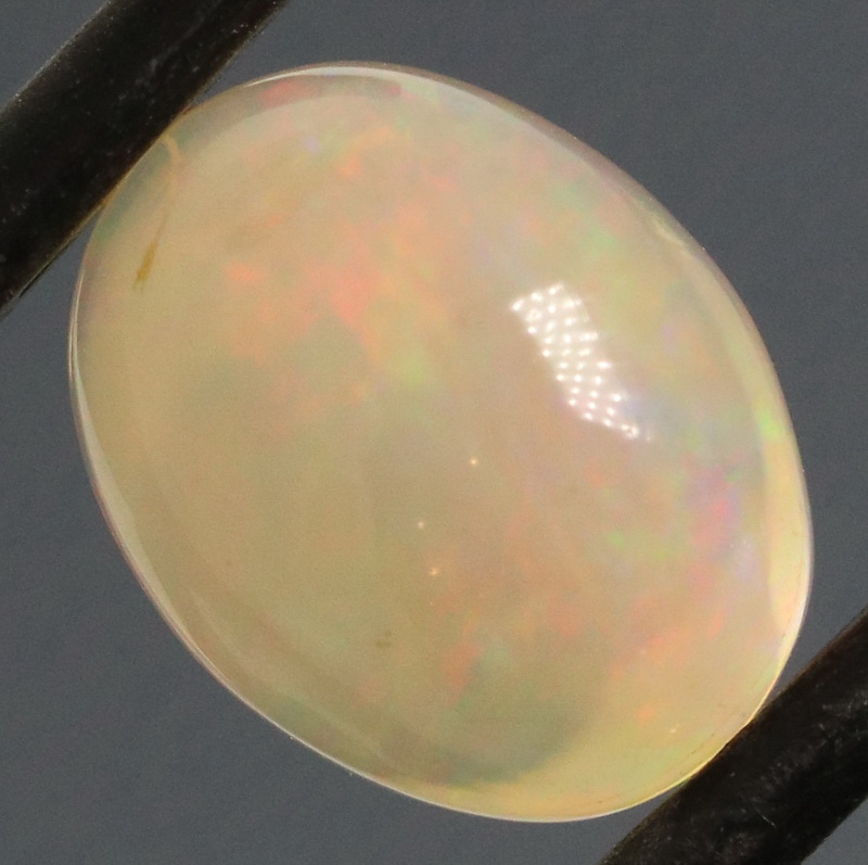 Gorgeous floral flashing 2.24ct Jelly Opal