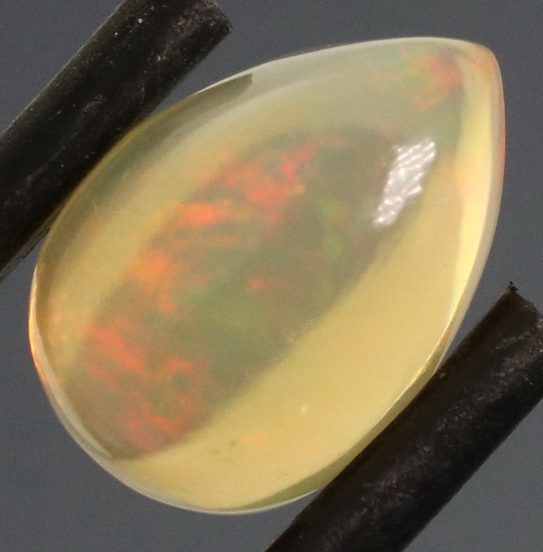 Gorgeous red and orange flashing 1.62ct Jelly Opal
