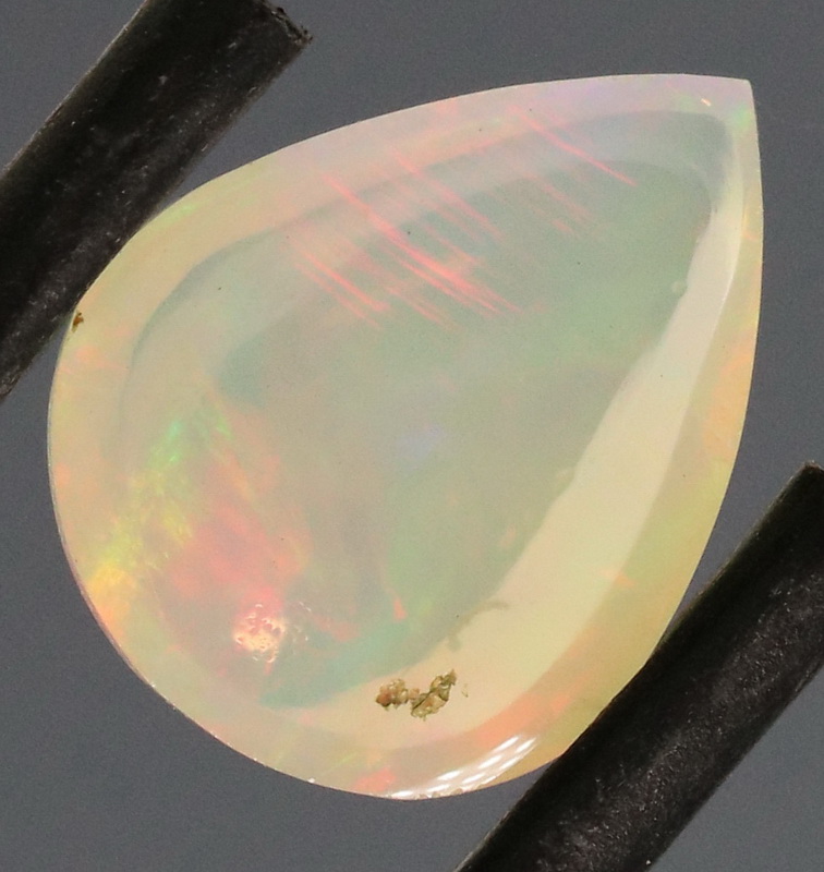 Vivid flashing unheated 1.43ct Jelly Opal