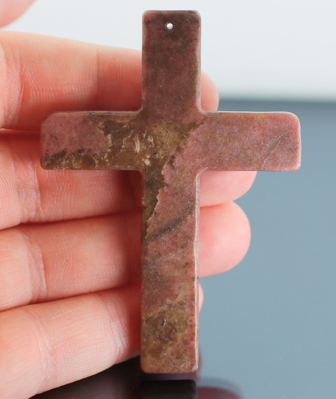 Striking 111.40ct Rhodonite cross pendant