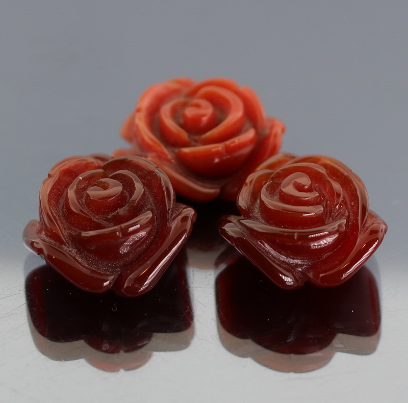 Lovely 3.93ct red Agate flower carvings