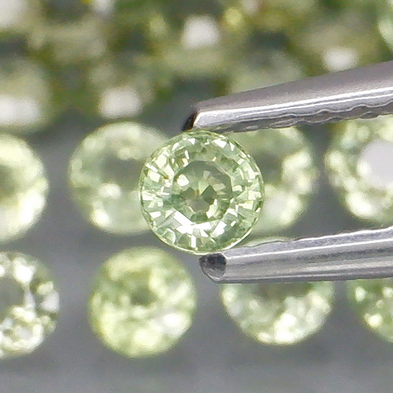 Awesome 5.09ct diamond cut GREEN Sapphire set
