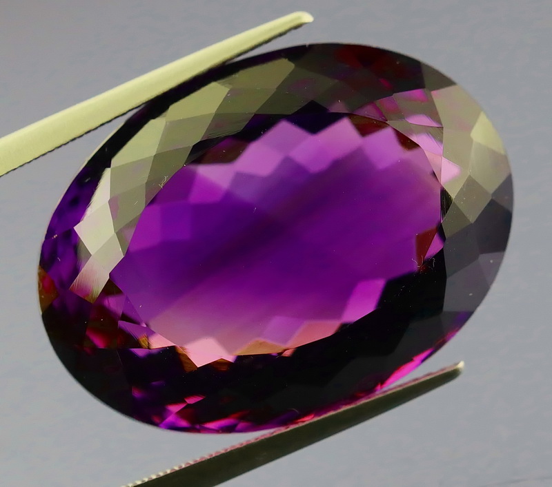 Substantial oval cut 45.83ct violet Amethyst