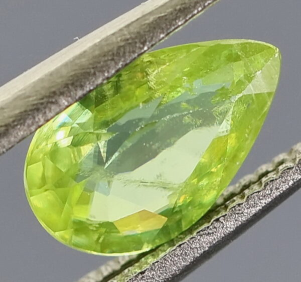 Sparkling .65ct color shifting Russian Sphene