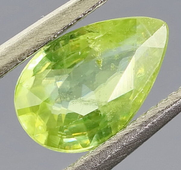 Sparkling .65ct color shifting Russian Sphene
