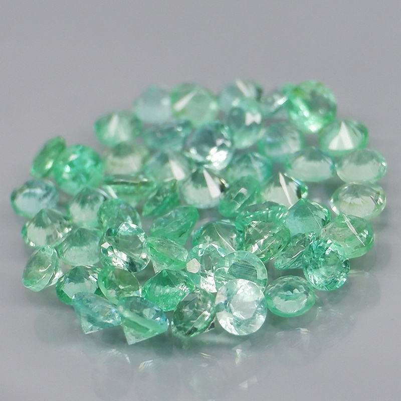 Tremendous 1.77ct 50pc. Emerald set
