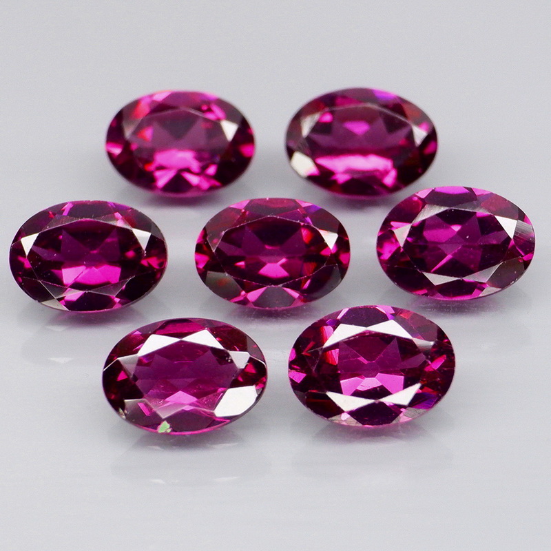 Remarkable 6.57ct violet pink Rhodolite Garnet set