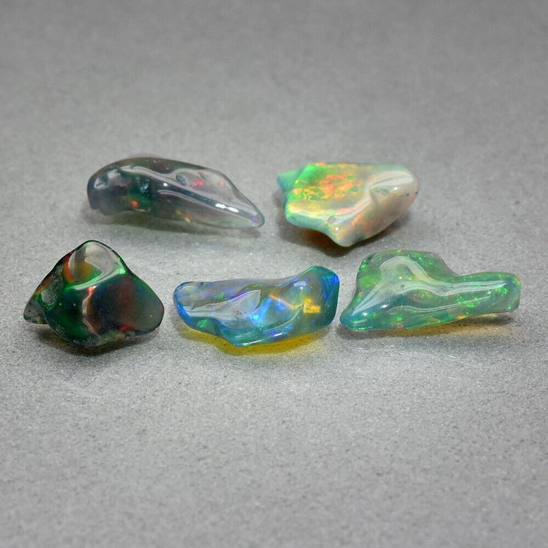 Beautiful 5.10ct 5 piece free form black opal set