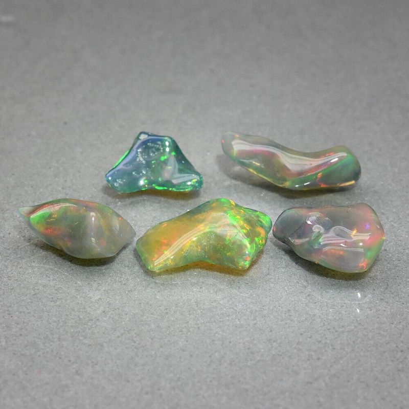 Captivating 5pc. 4.76ct free form Opal set