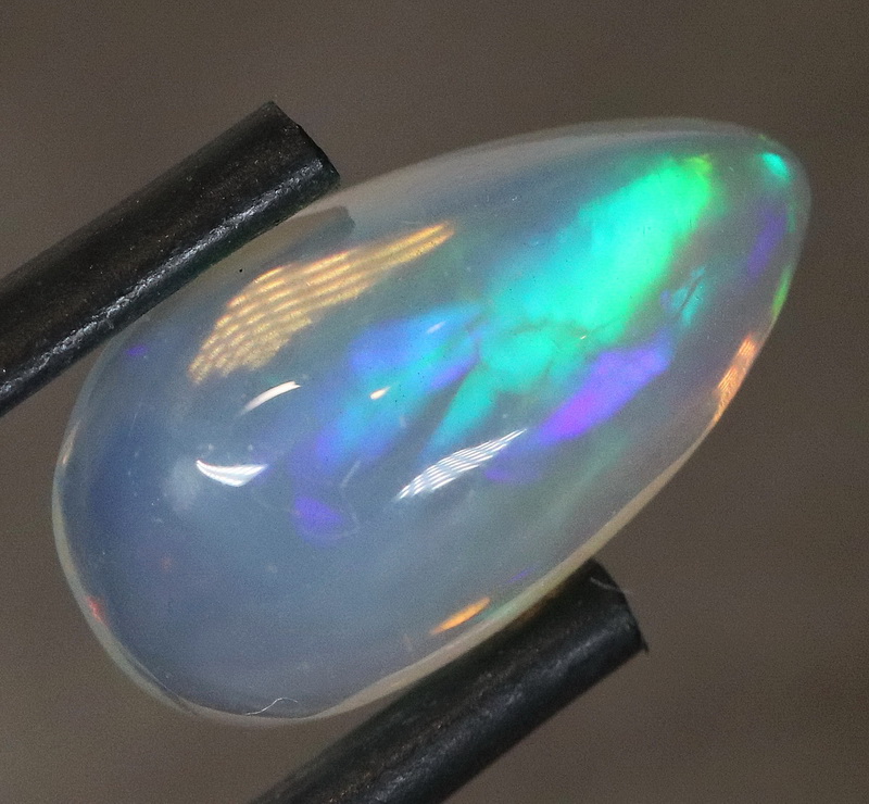 Glowing! 2.68ct full cover multi-pattern Jelly Opal