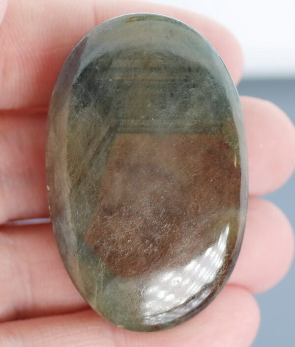 Shimmering 249ct earth toned Sapphire cabochon