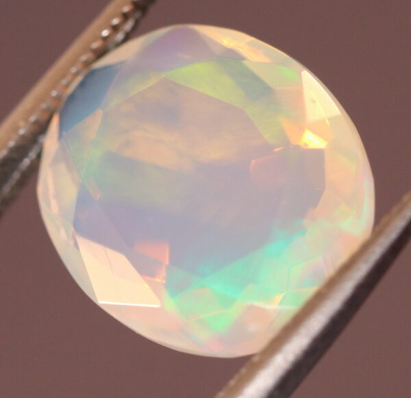 Beautiful 2.33ct fully faceted fairy fire jelly Opal