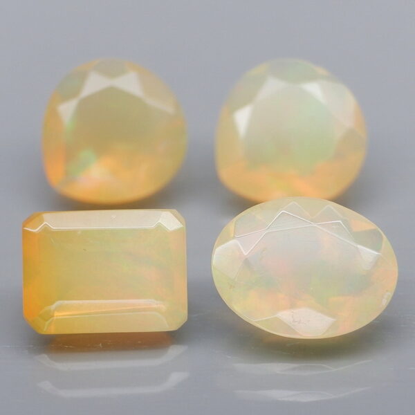 Mixed cut 3.93ct unheated faceted Jelly Opal set