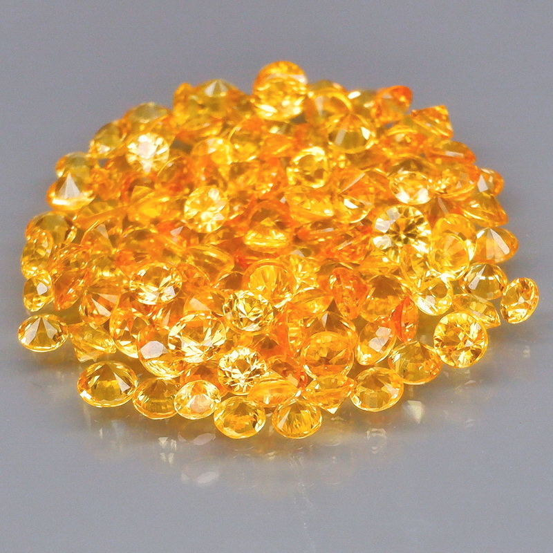 Incredible 3.70ct diamond cut golden Sapphire set