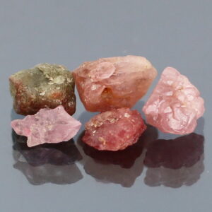 Collectable 9.61ct mixed hue uncut Spinel set