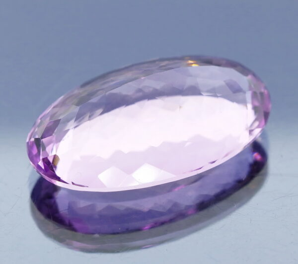 Glittering oval cut 31.91ct violet VS Amethyst