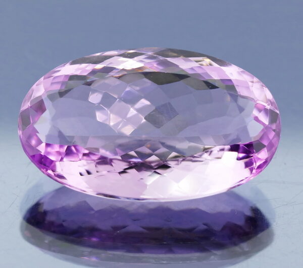 Glittering oval cut 31.91ct violet VS Amethyst