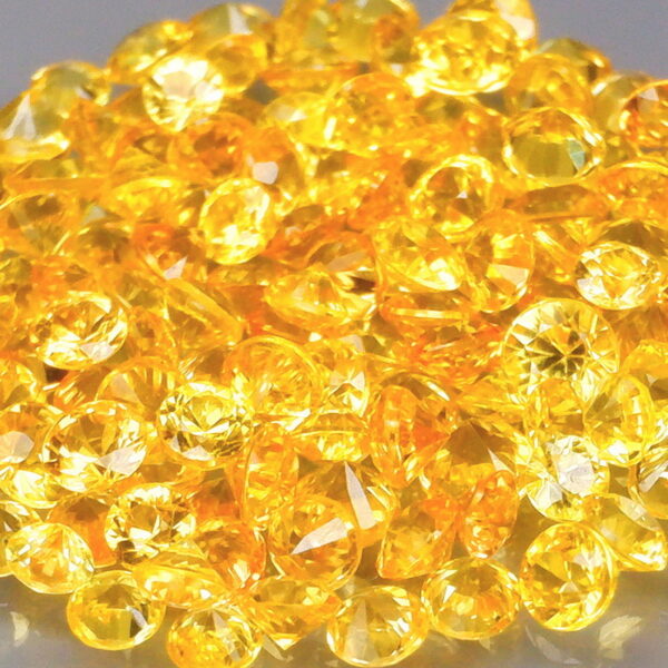 Charming 4.02ct golden yellow round cut Sapphire set