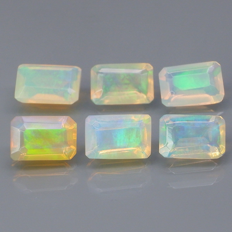 Smoldering 2.28ct unheated faceted Jelly Opal set