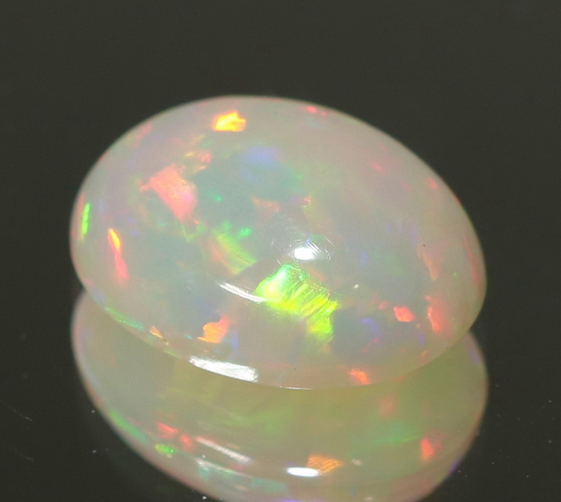 Captivating 2.75ct floral block flashing Opal