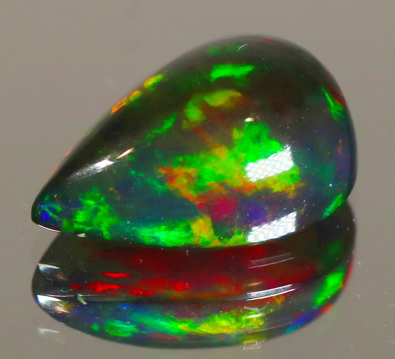 Exciting! 2.70ct floral fairy fire flashing Black Opal