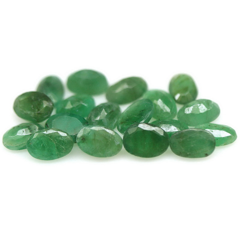 Rich green unheated 7.40ct 5.9x4.1mm Emerald set