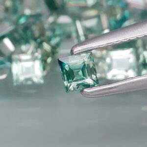 Heated only! 3.38ct blue green Sapphire set