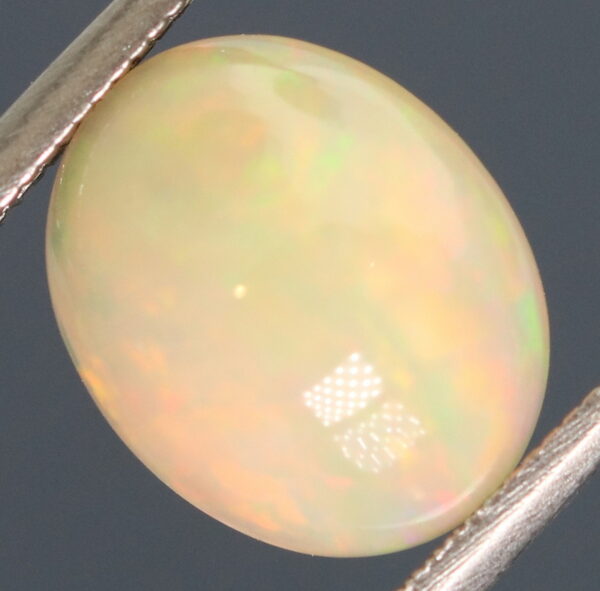 Brilliant flashing 1.83ct semi-black Opal