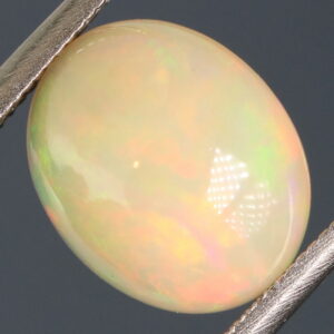 Brilliant flashing 1.83ct semi-black Opal