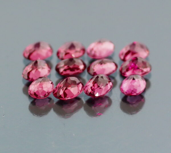 Ravishing 13.53ct violet pink Rhodolite Garnet set